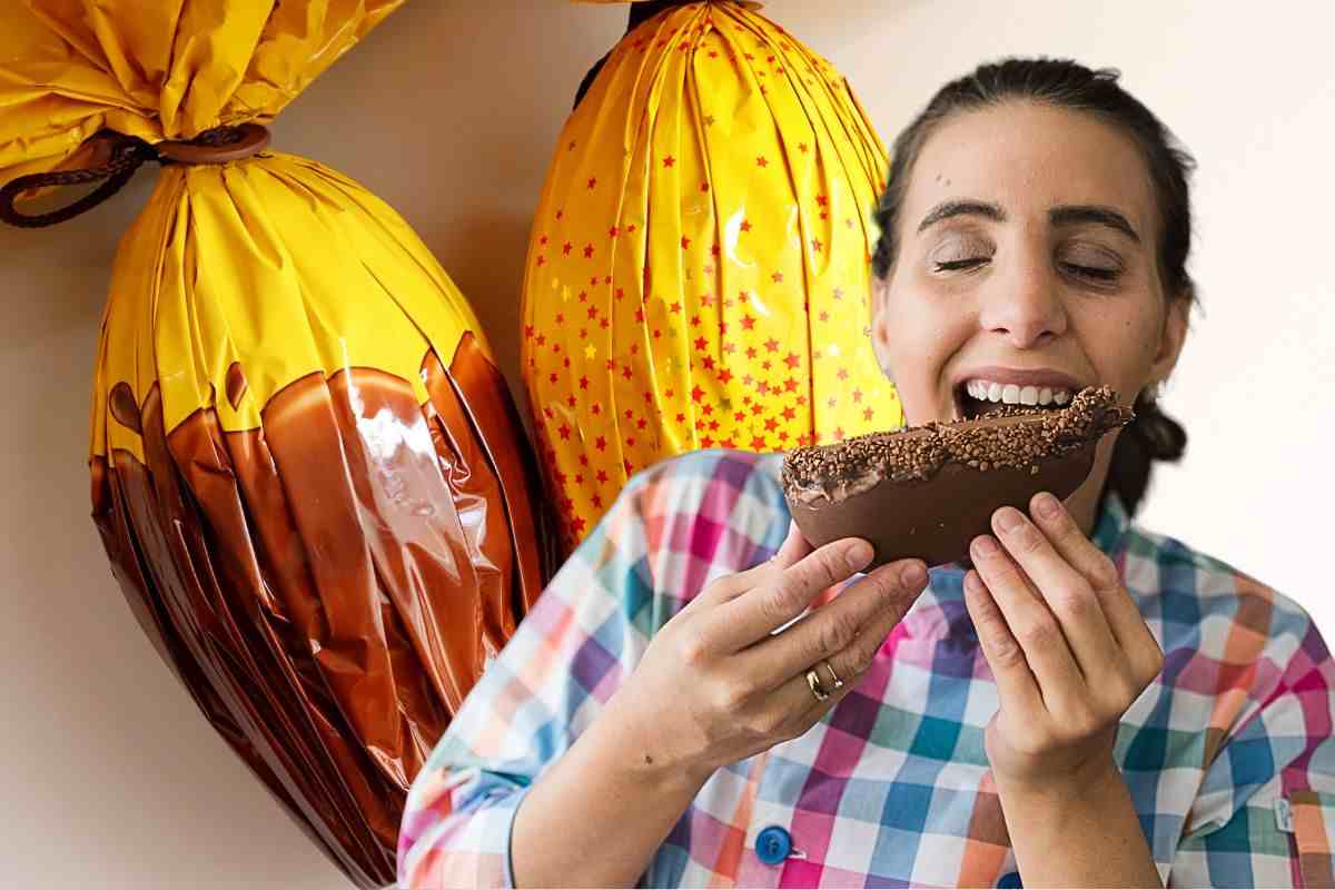 Ragazza addenta uovo al cioccolato